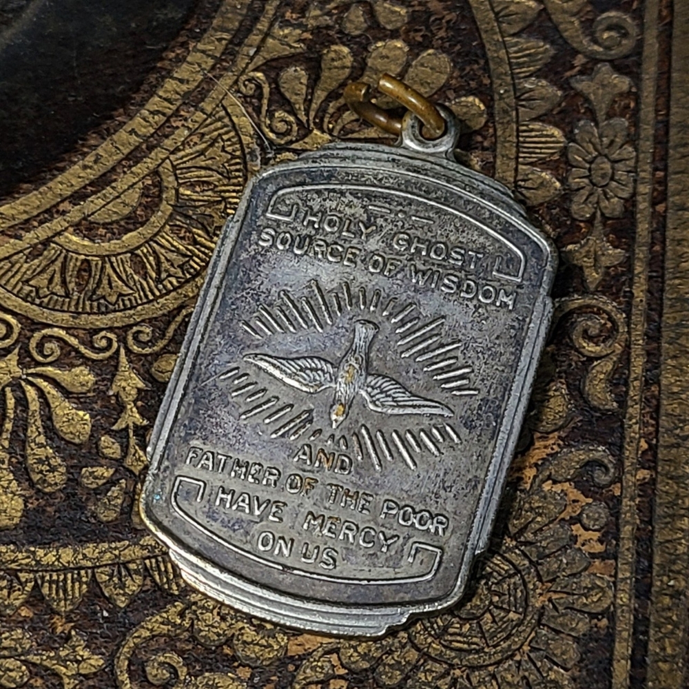 Lovely St. Therese Neumann pendant.